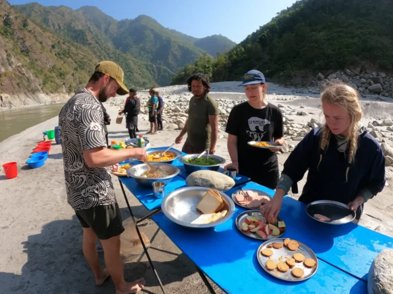 People serving lunch by the riverside