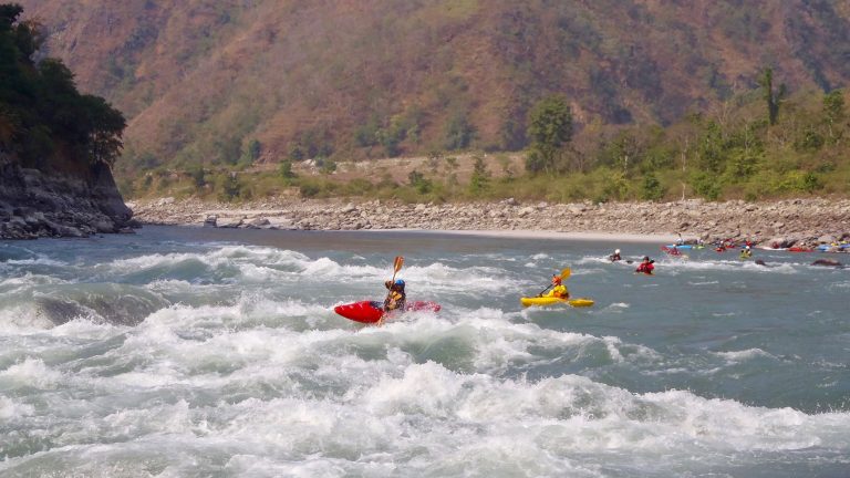 Kayaking George Rapids, on Sun Koshi river, Nepal.